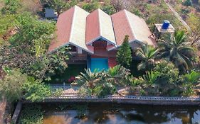 Aranyam Villa By Stayvista With Modern Wooden Interiors, Kidszone, Indoor Games & Plunge Pool